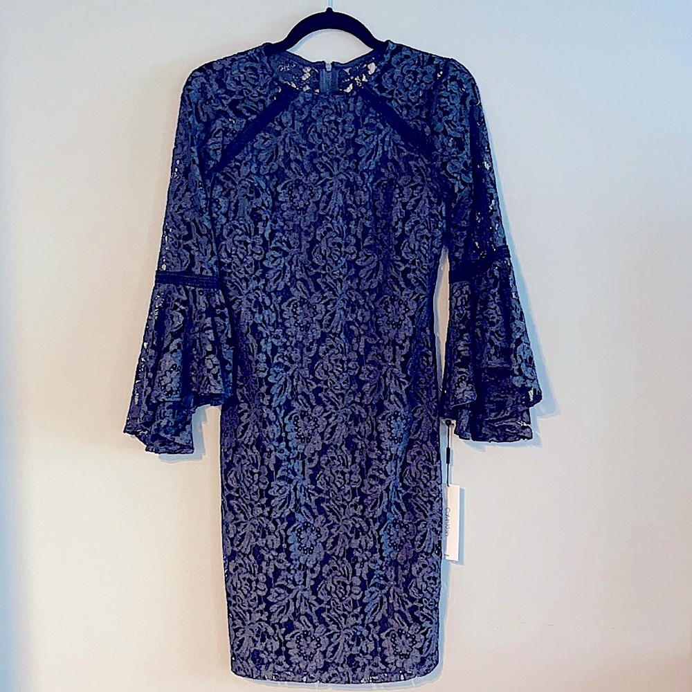 Floral lace, Navy blue dress Statement Sleeves.